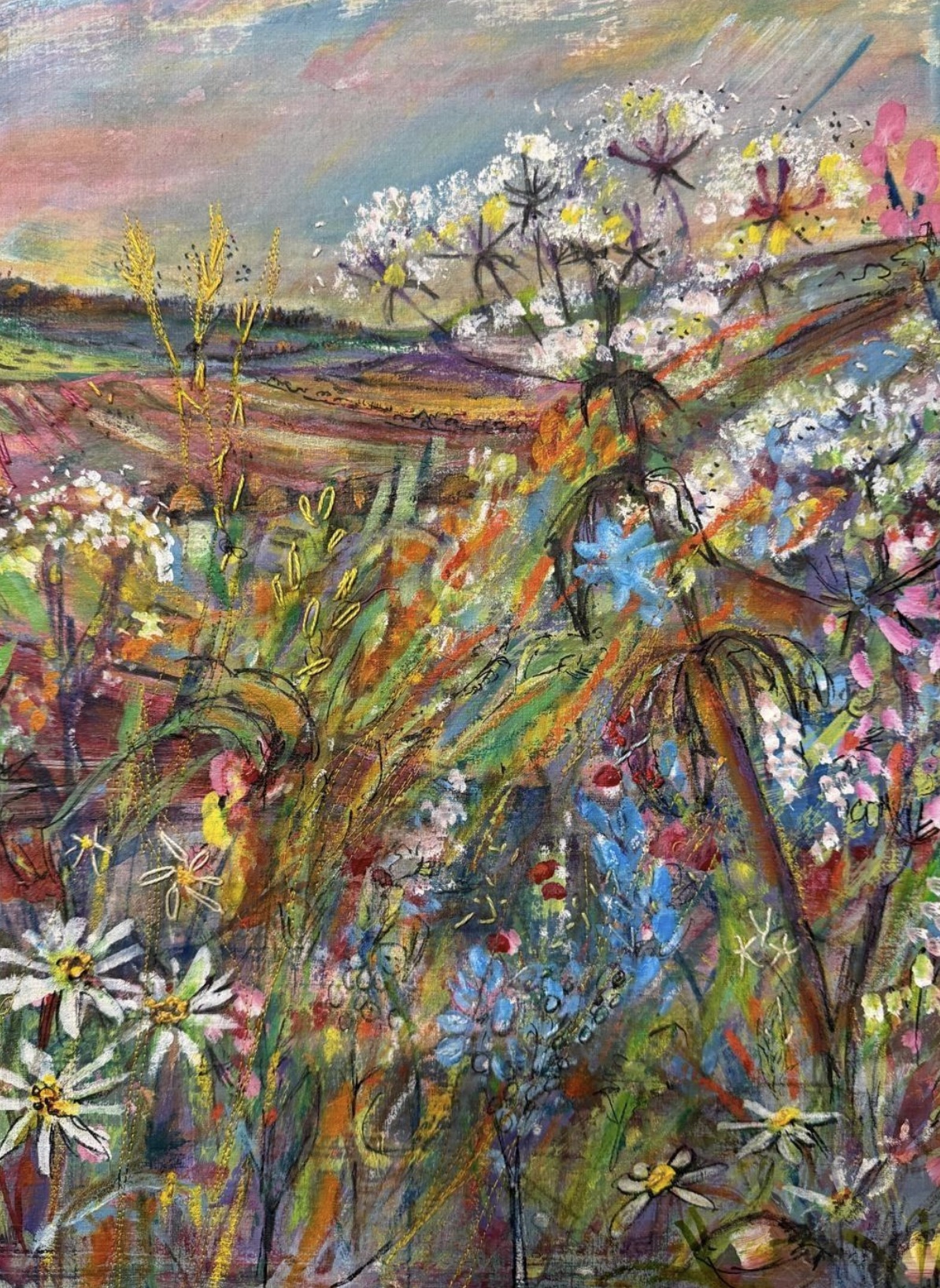 Expressive meadow landscape filled with layered marks, flowers and bright colour